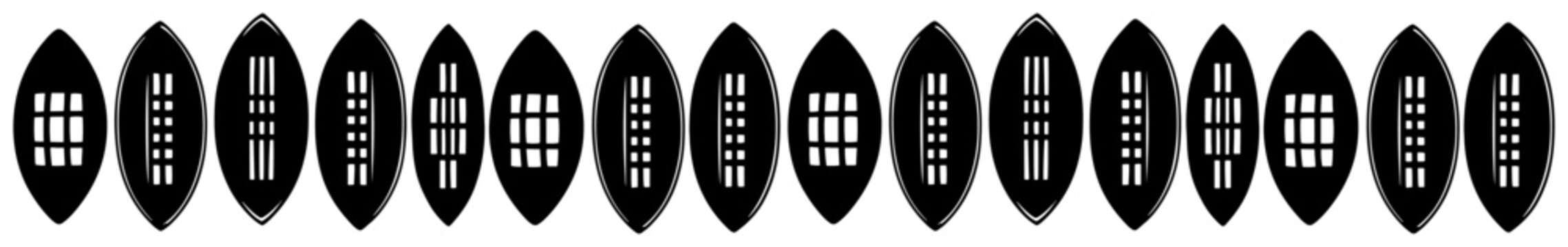 Traditional african shields set with minimalist tribal markings and symbols in silhouette style