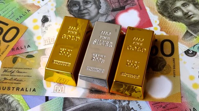 Gold and silver bullion or ingots as metals for bank storage, investments, and financial transactions. Gold and silver bars as a backdrop for your design