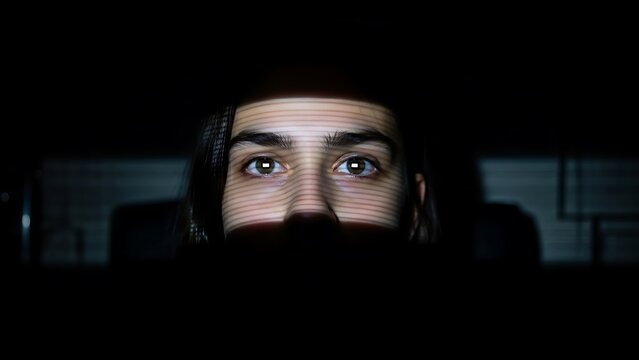 Man wearing black face mask looking.