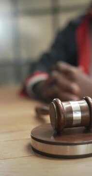 Judge hitting the gavel to finalize a decision