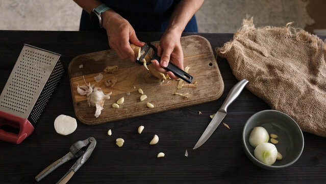 Woman Peeling Ginger