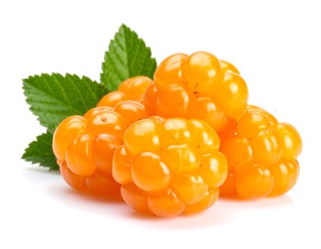 Fresh cloudberries with green leaves on white background, white background