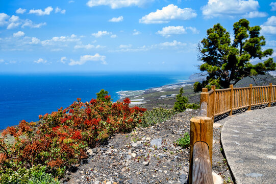 Panoramic view from Mirador near El Charco over Atlantic Ocean, coast and green slopes on La Palma.