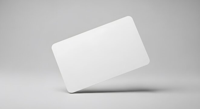 A blank white rectangular card with rounded corners floating in the air against a light grey background, casting a subtle shadow.