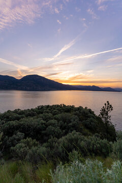 Okanagan Lake Sunset Landscape With Penticton Bc Silt Cliffs And Kvr Trails Views At Dusk