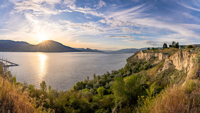 Penticton Okanagan Lake Sunset With Silt Cliffs And Kvr Trail Views, Scenic Canadian Landscape At Golden Hour