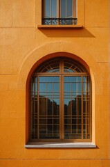 Obraz premium Portrait of orange window on gold wall background 