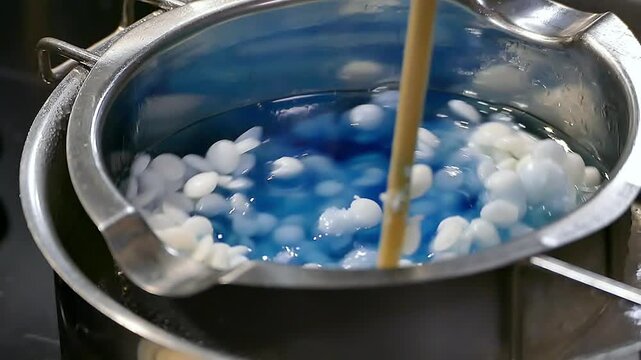 The process of melting wax for candles.