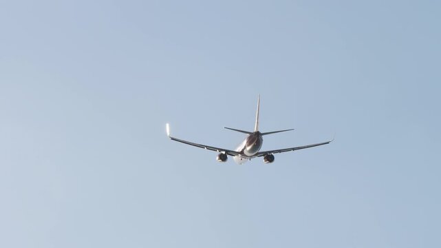 Jet aircraft taking off from runway at Phuket International Airport in Thailand.