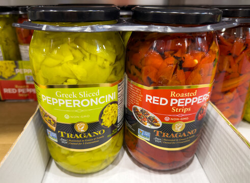 Tragano Greek Sliced Pepperoncini And Roasted Red Pepper Strips Jars Displayed On Store Shelf