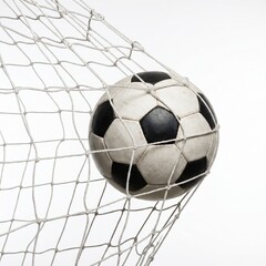 Naklejka premium Commercial sports photography of a soccer ball hitting the goal net on a white background.