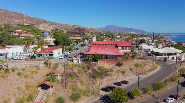 Aerial views showcase Santa Rosalia and its unique buildings in Baja California Sur, emphasizing the towns mining history and surroundings.