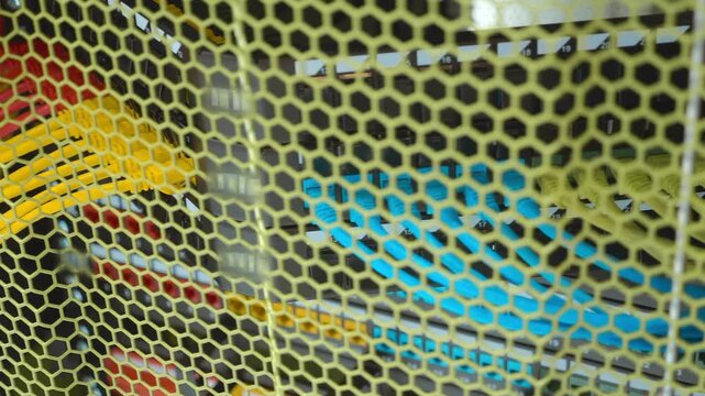 The internet hub has multiple sockets with wires of different colors connected to it to make installation, setup, and repairs easier. Closeup. Shot in motion