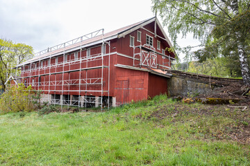 Old barn surrounded by scaffolding © Tobben-PHOTO