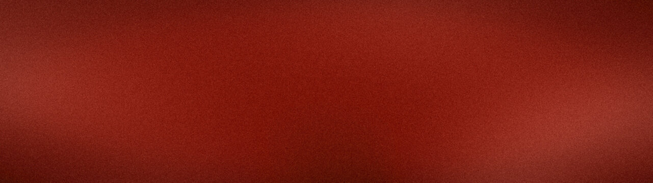 A premium wide abstract grainy background texture in rich red, maroon and burgundy shades