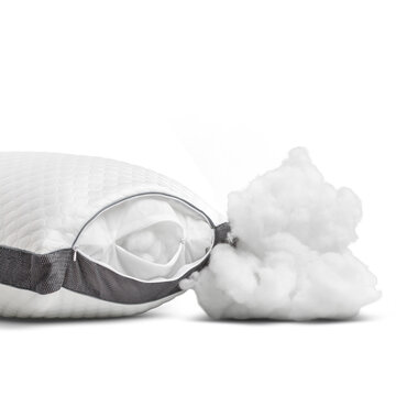 Open zipper on white pillow showing soft polyester fiber filling insulation.