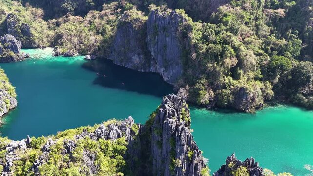 Big Lagoon is found amid the scenic limestone islands of El Nido. This area in the Philippines is a popular vacation destination due to its beautiful coral reefs, beaches, and hidden lagoons.