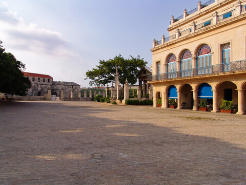 Plaza de Armas in Old Havana Cuba with historical colonial architecture alongside Castillo de la Real Fuerza