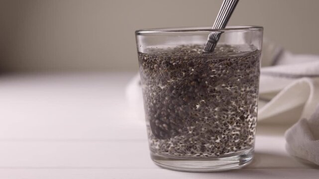 chia seeds on a light background. Useful supplements, super food, healthy food, veggie