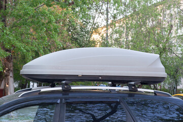 The trunk on the car roof to transport goods. © Александр Поташев