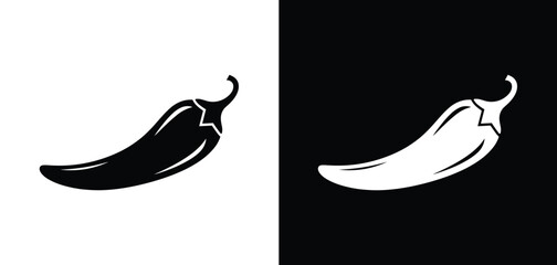 Chili Pepper Duo: A striking contrast of black and white chili pepper icons. graphic design, food ingredient, spicy flavor, cooking element, culinary icon. © Shuvo S