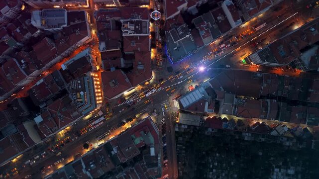 Connected autonomous cars navigating through illuminated city streets at night, advanced artificial intelligence and future transportation network technology