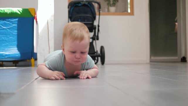 Young child crawls happily. Baby joyfully interacts with home surroundings through curiosity and awe. Cheerful infant explores first movements with wonder and eager curiosity