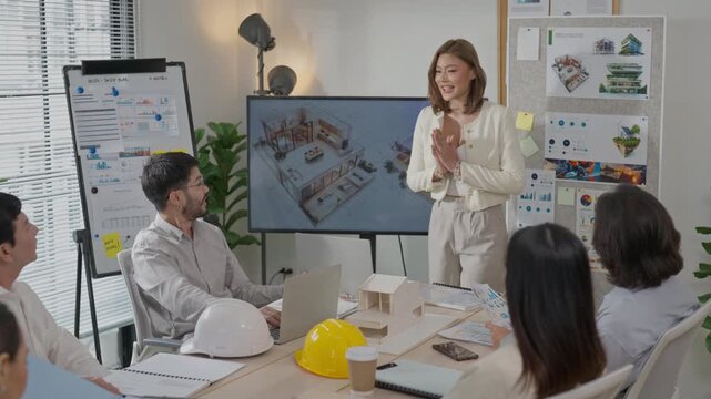 Architecture meeting room team presentation interior design woman presenter project planning office workspace collaboration session modern business discussion with model board chart whiteboard