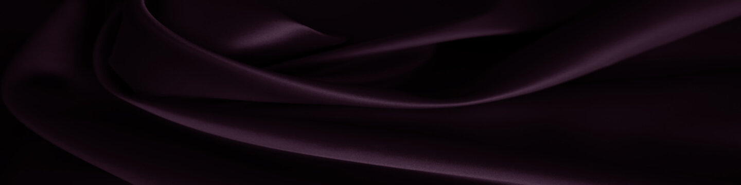 Black dark deep purple blackberry wine silk satin. Drapery curtain. Elegant luxury background. Plum noir color.Soft folds.Shiny shimmer glossy smooth fabric.Curved wavy lines, swirl.Design.Wide banner