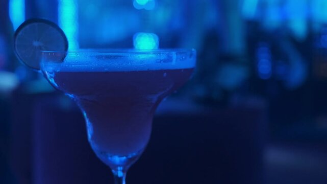 Cocktails: magical, colorful drinks in a disco atmosphere.