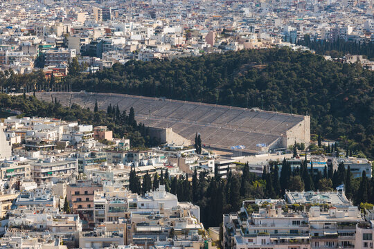 Athens, Attica, Greece, beautiful panoramic view of Athens cityscape, with The Parthenon, mountains, sea and scenery beyond the city, seen from Mount Lycabettus Hill observation deck in a sunny day