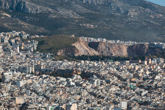 Athens, Attica, Greece, beautiful panoramic view of Athens cityscape, with The Parthenon, mountains, sea and scenery beyond the city, seen from Mount Lycabettus Hill observation deck in a sunny day