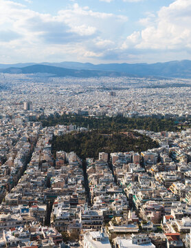 Athens, Attica, Greece, beautiful panoramic view of Athens cityscape, with The Parthenon, mountains, sea and scenery beyond the city, seen from Mount Lycabettus Hill observation deck in a sunny day
