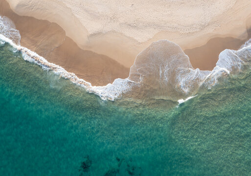 Nobbys Beach - Newcastle NSW Australia - Aerial top down very of beach