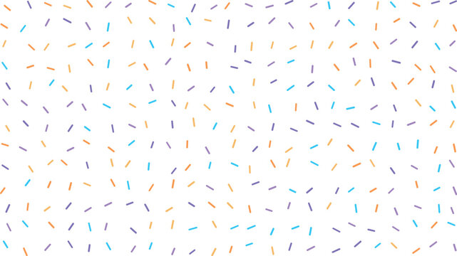 A charming scatter of blue orange and purple sugar sprinkles creates a whimsical sweet pattern on white
