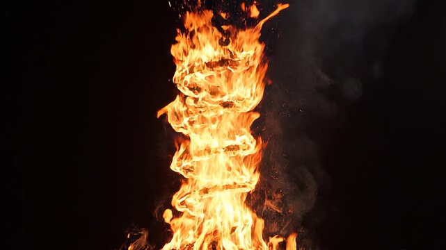 spiraling flames consuming metal coil against dark background