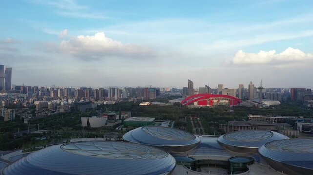 Modern Jinan Skyline with Sports Venues Under Blue Sky in Jinan, China