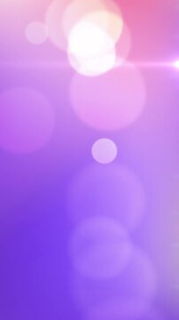 Vertical abstract background with soft pink and purple pastel bokeh particles floating alongside a gentle glowing lens flare and lighting effect