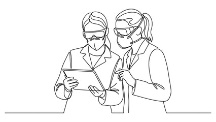 Obraz premium Two medical professionals reviewing patient data.