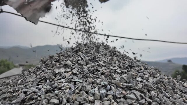 Close‑up view of large crushed gravel aggregate pile for construction and landscaping.