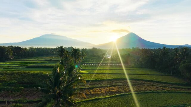 Aerial Drone View of Mount Merapi and Mount Merbabu at Sunrise in Central Java Indonesia