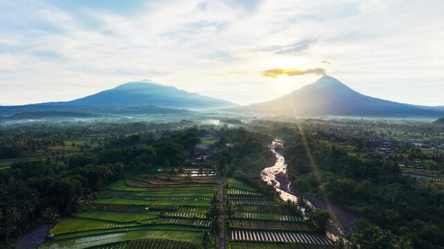 Aerial Drone View of Mount Merapi and Mount Merbabu at Sunrise in Central Java Indonesia