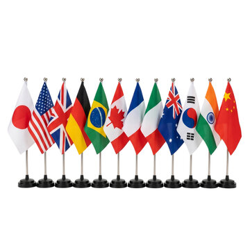 Mini Desk Table Flags of Various Countries on Stands Isolated on White Background