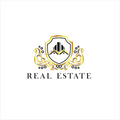 Obraz premium Luxury Gold Real Estate Logo Design with Modern Building Icon and Elegant Ornament