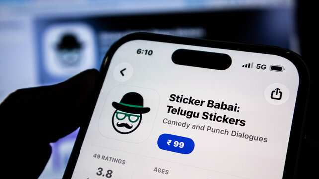 Closeup of a smartphone screen displaying the app store page for sticker babai telugu stickers with a price of 99 indian rupees