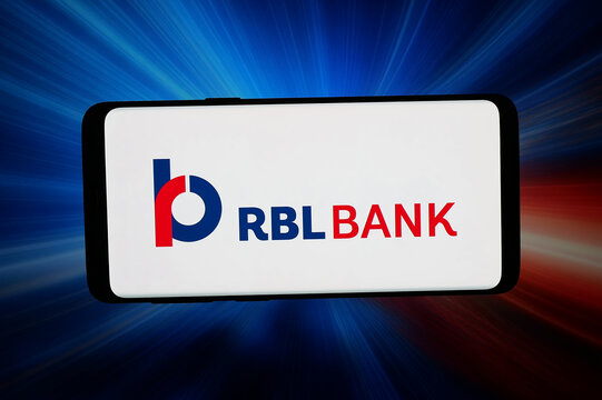 Stuttgart, Germany - 05-13-2026: In this photo illustration, the logo of Indian financial company RBL Bank is displayed on a smartphone in front of abstract background on computer screen.