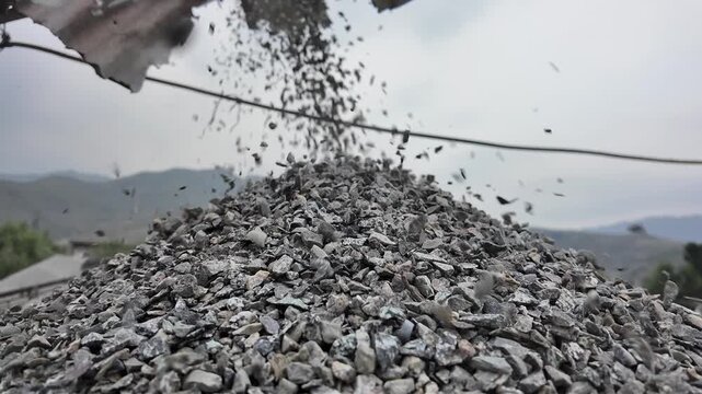 Close‑up crushed gravel aggregate pile for construction and landscaping.