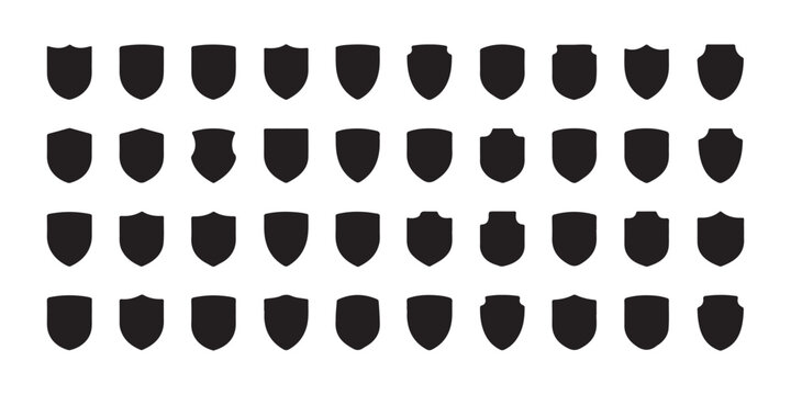 Collection of various shield emblems and heraldic shapes on white background for design.