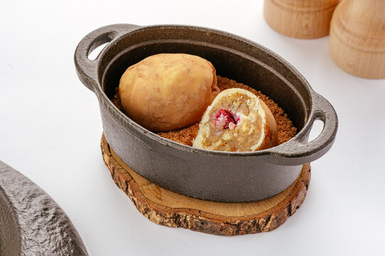 Gourmet trompe l oeil potato dessert in cast iron dish