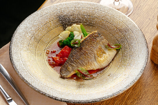 Gourmet pan seared dorado fillet with vegetables